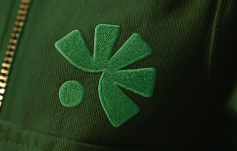 Logo CCPA brodé en vert sur un textile